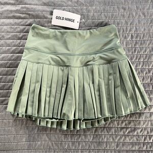SOLD XS Gold Hinge pleated skirt